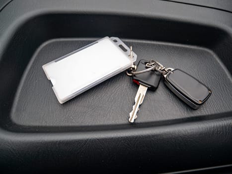 Car keys with keychain. Place for text. Transport.
