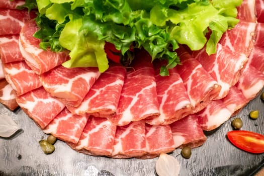 Variety of Cold cut, pork and beef salami, for salad station in buffet line