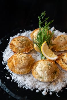 deep fried Hokkaido Scallops Shell with crusty bread serve with lemon and salt.