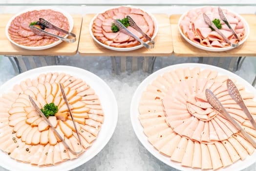 Variety of Cold cut, ham pork beef salami and sausage, for salad station in buffet line