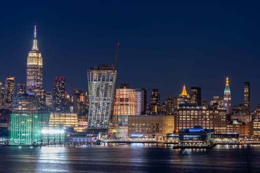 Aerial view of New York city Mid town Skylines cityscape from New Jersey at dusk