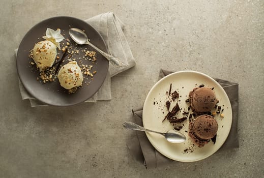 Set of ice cream scoops with chocolate and vanilla flavours