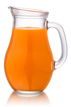 Pitcher of freshly pressed carrot juice or smoothie, isolated
