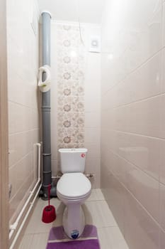 Russia, Moscow- June 11, 2019: interior room apartment. standard repair decoration in hostel. bathroom and toilet