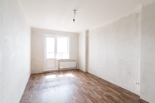 Russia, Moscow- June 11, 2019: interior room apartment. standard repair decoration in hostel. rough repair for self-finishing. finishing stage of construction
