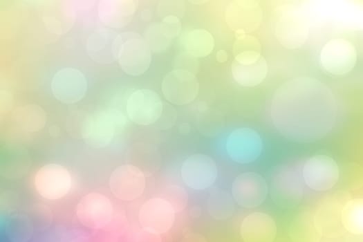 Abstract blurred fresh vivid spring summer light delicate pastel yellow pink orange green bokeh background texture with bright circular soft color lights. Beautiful backdrop illustration.