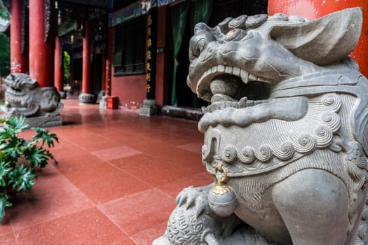 Lion head sculpture figure in the courtyard of the Wenshu Monastery, Chengdu, China