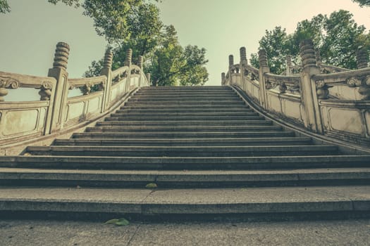 Empty wide stairs of marble bridge on Shan Lake, Guilin town, Guangxi Province, China