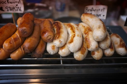 Delicious  Grilled sausages using torch.
