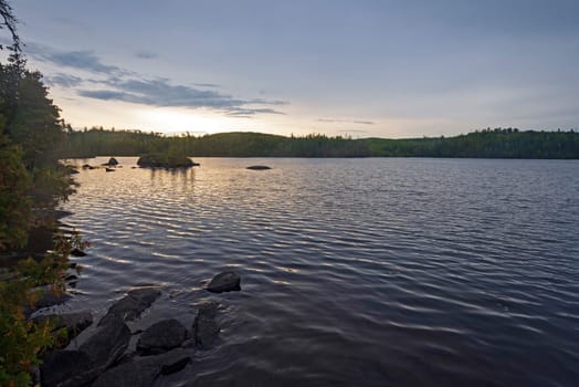 Storm Clouds at Sunrise on Long Island Lake in the Boundary Waters in Minnesota
