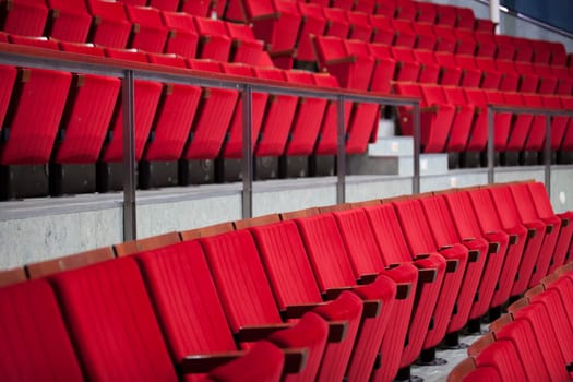 Background of red theater chairs. Selective focus