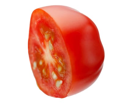 Levitating halves of cherry tomatoes close-up isolated on a white background