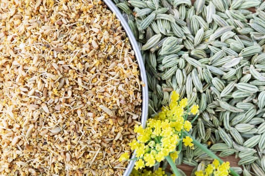 Fennel pollen, seeds and flowers close up.