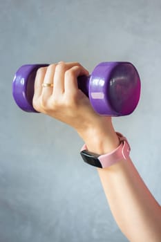 Healthy lifestyle concept female wearing sport tracker wristband arm, stock photo
