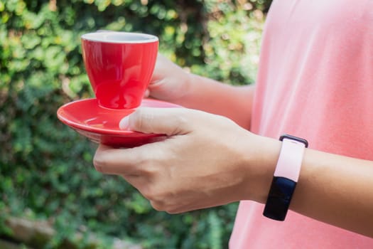Healthy lifestyle concept female wearing sport tracker wristband arm, stock photo