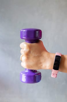 Healthy lifestyle concept female wearing sport tracker wristband arm, stock photo