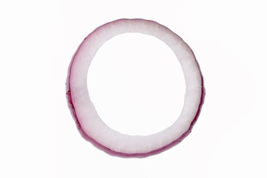 Red onion flying ring isolated on a white background, with selective focus