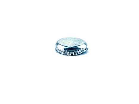 Beer bottle cap on a white background. Place for text.