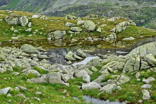 Pond in the high mountains of the Hohe Tauern near the Weißsee
