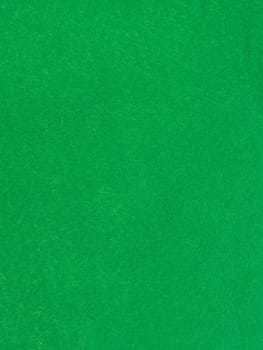 A close up shot of green felt