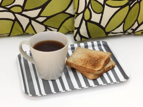 A close up shot of a wooden breakfast tray