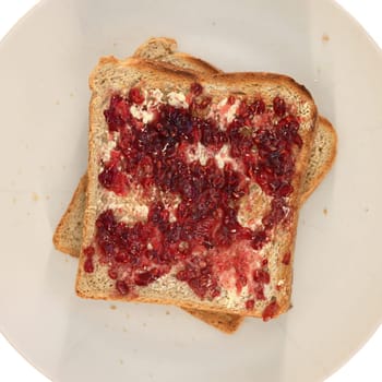 A close up shot of jam on toast