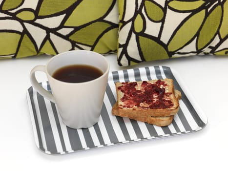 A close up shot of a wooden breakfast tray