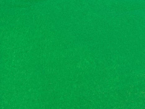 A close up shot of green felt
