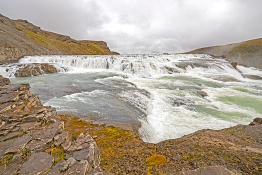 Panoramic View of a Roaring Cascade of the Upper Gullfoss Falls in Iceland.