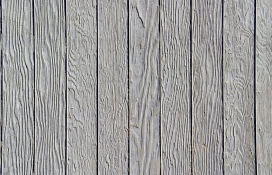 Pattern of wooden boards imprinted on concrete