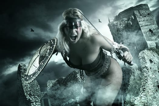 Ancient woman warrior or Gladiator posing outdoors with sword and shield