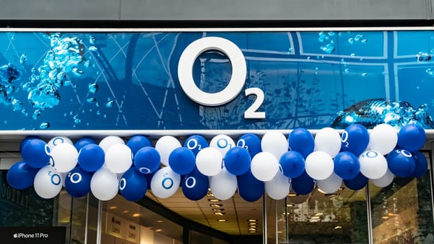 FRANKFURT/MAIN, GERMANY - OCTOBER 5th 2019: The O2 company logo with balloons above the entrance to one of their stores in Frankfurt city centre.