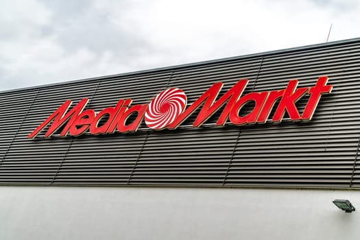 WETZLAR GERMANY- OCTOBER 5, 2019 : the logo of the chain stores selling household appliances and electronics MEDIAMARKT at the shopping centre