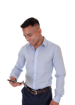 A young man is looking at his smart phone and is very happy about the.message he got, isolated for white background.