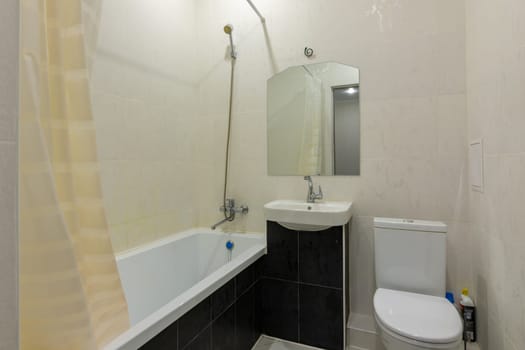 Interior of a small combined bathroom and toilet