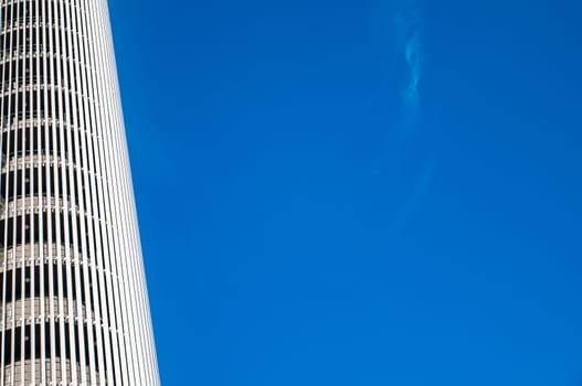 Office wall against the blue sky. Place for text. Background.