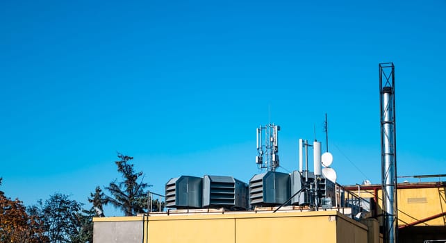 Communications on the roof of the building. Mobile connection. Air ventilation. Technologies.