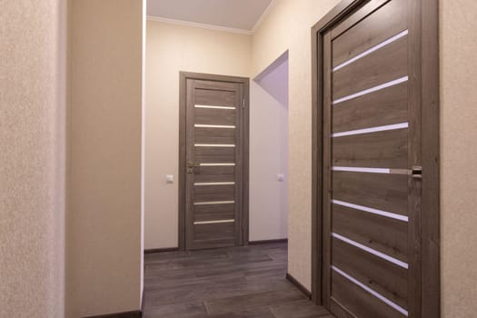 Corridor in a small apartment, closed doors
