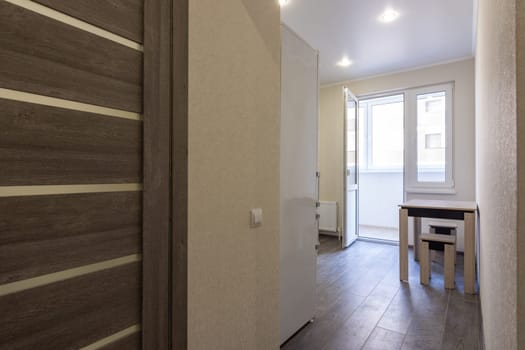 Access to the kitchen in a studio apartment