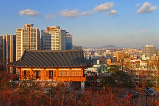 The sunset on the pagoda and the skyscrapers