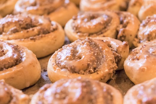 Delicious leavened dough pastries for breakfast, dessert or brunch. Yummy juicy backed traditional goods from bakery or confectionery.