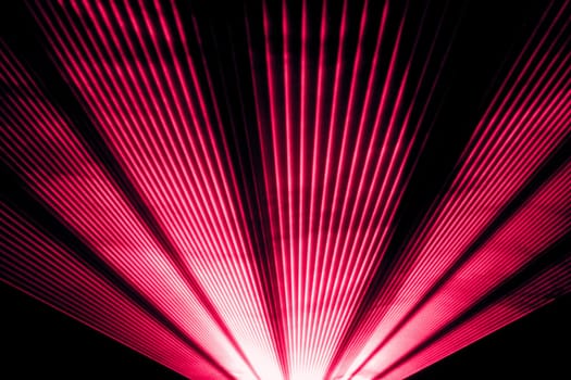 Luxury entertainment in nightclub event, festival, concert or New Years Eve. Ray beams are symbol for science and universe research.