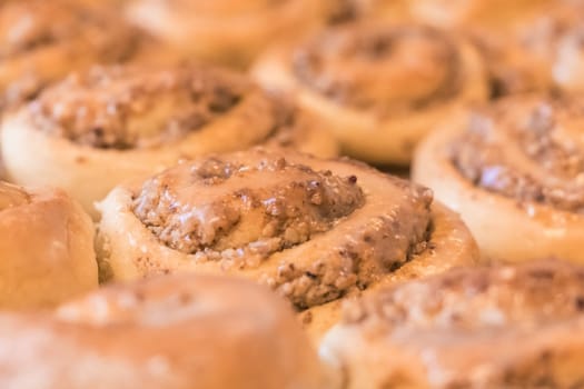 Delicious leavened dough pastries for breakfast, dessert or brunch. Yummy juicy backed traditional goods from bakery or confectionery.