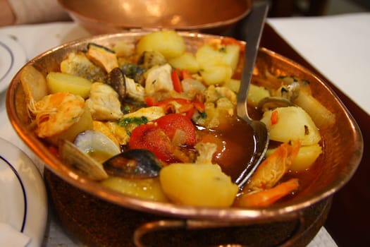 Cataplana specialty in a copper casserole
