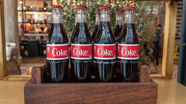 GERMANY, FRANKFURT/MAIN, October 05 th, 2019. Coca cola glass bottles in a wooden box.