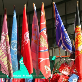 LONDON, UNITED KINGDOM - NOVEMBER 23: Football Flags for Sale in London on NOVEMBER 23, 2013. Various Soccer Clubs Flags at Portobello Market in London, United Kingdom.