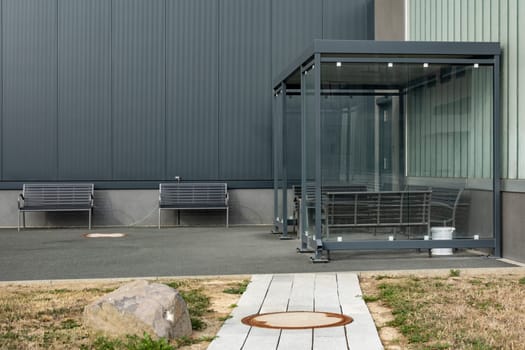 Modern outdoor relaxation area with bench outside