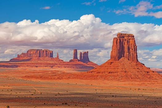 Clouds and Sun Over Desert Buttes in Monument Valley in Arizona