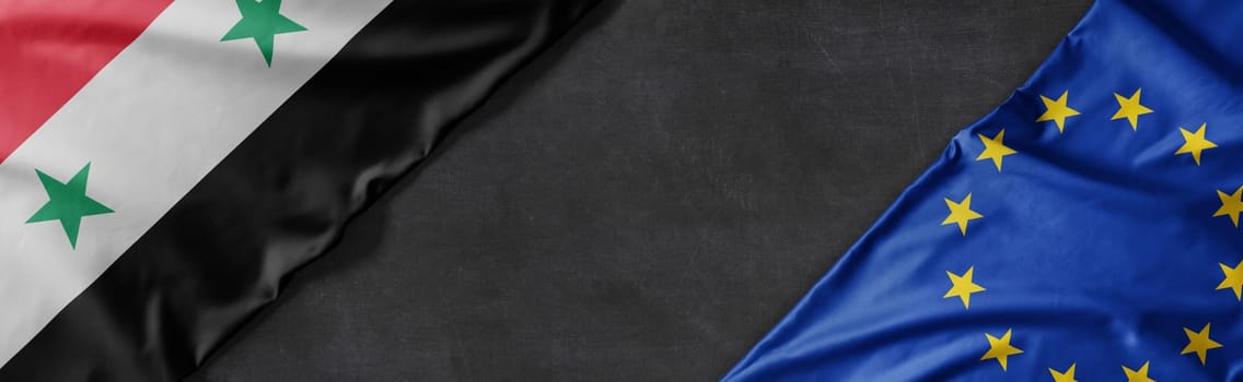 Flags of Syria and the European Union with copy space
