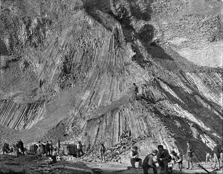 Basalt extraction on the banks of the Rhine, vintage engraved illustration. From the Universe and Humanity, 1910..